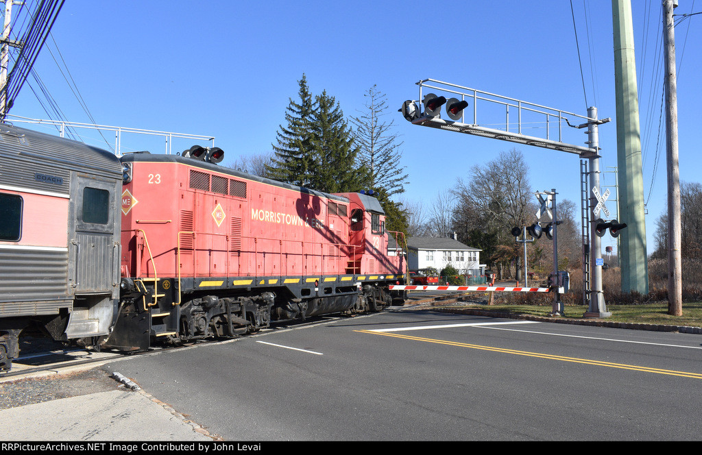 The 23 leading the Polar Express train across Jefferson Avenue Xing